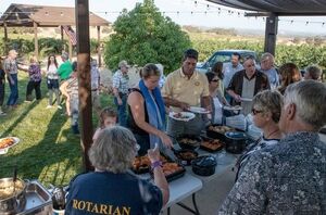 Rotary club solar-cooked dinner in August 2014.