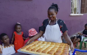 SELF 8, 11-20-24.png (2.13 MB) A tray of rolls are ready for sale