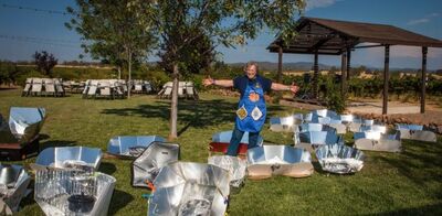 Irene Perbal with solar cookers, 9-18-14