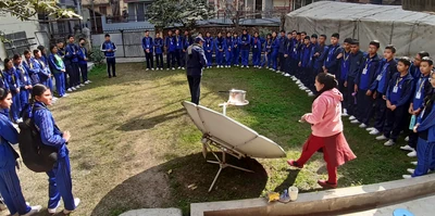 a parabolic solar cooker is demonstrated