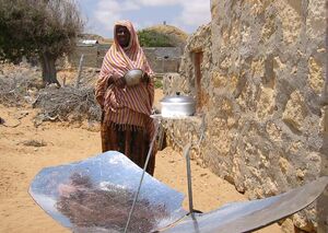 Somalia woman with cooker