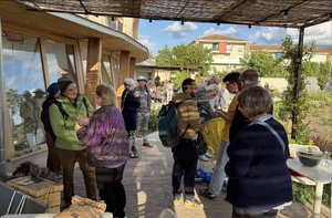 Le Presage 1, 5-25.png (4.25 MB) CONSOLFOOD2025 attendees gather before the mid-day meal. Photo credit: Kurt Neubek