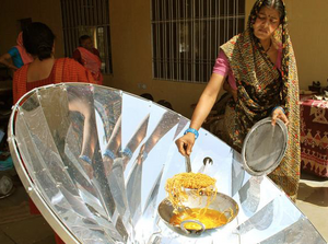 Parabolic solar cooker, India, CNN, 10-21-21