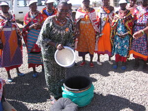 Rice cooked in a hay basket after brought to a boil on a stove.