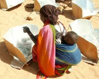 Touloum November 2009 refugee woman with baby