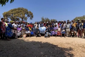 TH 2, 9-19-25.png (1.29 MB) The students demonstrate their version of a parabolic solar cooker to villagers in Zimbabwe