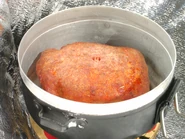 11) Rôti de dinde pané 0,35 kg (réchauffé)