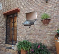 Through the wall solar cooker outside