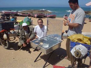 Vendors selling fish in Morocco