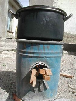 Rocket stove made from barrel in Bolivia