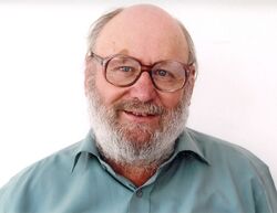  awarded OBE by Queen Elizabeth II