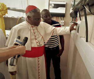 Cardinal Turkson inaugurating the new solar system