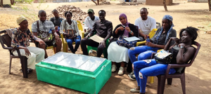 Ecomandate training of the enumerators with the large ULOG box oven - Photo credit Ecomandate Foundation