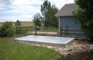 A family garden has been covered temporarily with plastic film, creating heat to kill unwanted pathogens, Photo credit: Eco Peanut