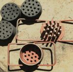 Beehive briquettes and the briquettes mold (ICIMOD, 2009)