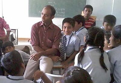 Vivek Kabra explains the benefits of solar to young students, 1-23-14