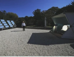 Antonio Durbe standing with the Pursole  coffee roaster in Rome, Photo credit: Andrew Medichini