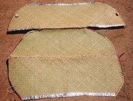 Woven grass is used to create the panels of the solar cooker.