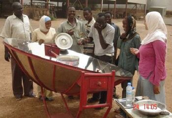 (SEEC) parabolic cooker in use