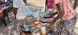 Preparing the ingredients for the solar cookers