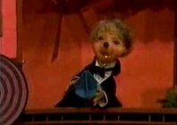 Corny the Beaver (Holding what may be one of the Parts)