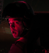 Will Austin as G.U.N. Helicopter Pilot