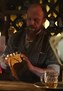 Vladimir Raiman as Tavern Bartender