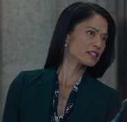 Jeanie Cloutier as Businesswoman