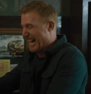 Sandy Robson as Bar Patron