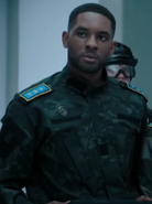 Reggie Banigo as Rockwell's Assistant