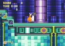 An "S" Monitor being destroyed by Tails.