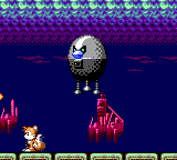 Tails fighting Sphere-o-Bot Boss.