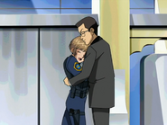 Topaz hugs Tanaka