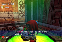 Knuckles obtaining the Hammer Gloves in Sonic Adventure 2: Battle.