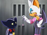 Rouge manipulating Bokkun.