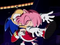 SX63 Amy hugs Sonic