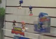 What appears to be shadow, next to tails, and metal sonic, at the top