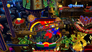 A pinball section on the building in front of the main piinball table.