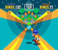 Sonic and Tails receiving a Chaos Emerald.