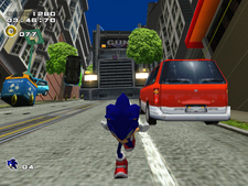 Gameplay screenshot showing Sonic running away from the GUN truck at the end of the level City Escape.