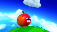 Master Zik rolling a giant apple to crush Sonic.