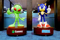 Statues of Sammy and Sega's mascots, Aliyan and Sonic, in the Sega Sammy reception area. (2020)