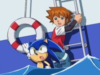 Sonic and Chris climbing aboard