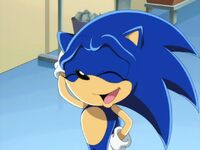 Sonic chuckling like “Aw, shucks”