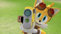 Tails holding the camera