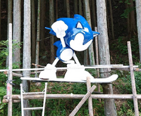 Picture of the restoration process, where the statue was given a new coat of blue paint.