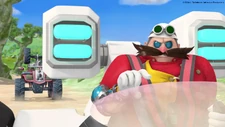 Eggman racing with his Eggmobile.