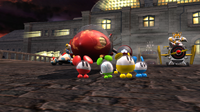 Chuih, ChuPea, ChuBei, and ChuBach with the ChuChu Rocket after winning a race in Sonic & Sega All-Stars Racing.