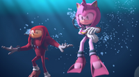 Knuckles and Amy underwater