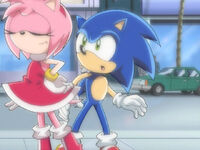 Sonic appears to be impressed by Amy.